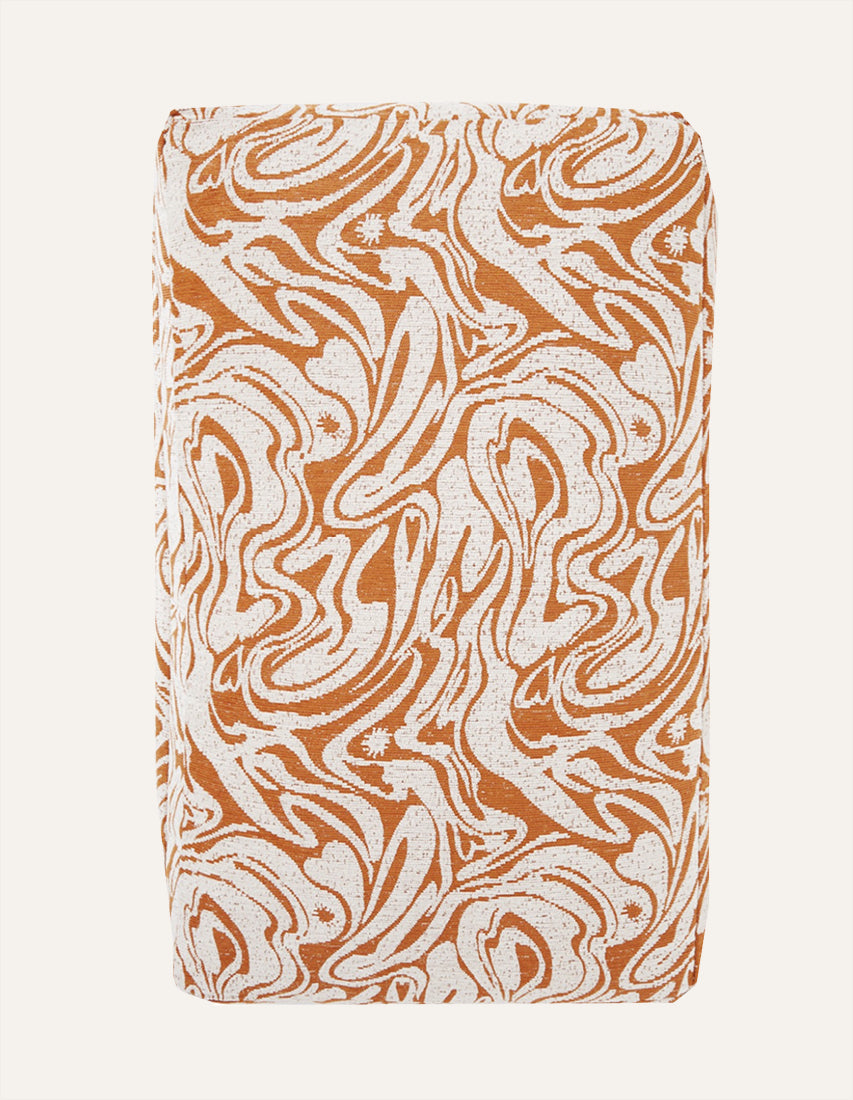 Swirl dog bed - orange / beige